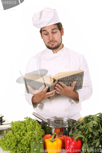 Image of young chef preparing lunch 