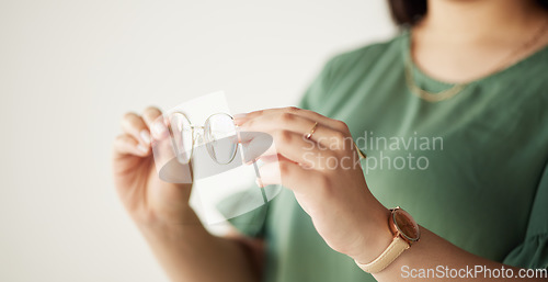 Image of Hands, glasses and vision for optometry with women for healthy sight with prescription lens. Spectacles, eye and female person holding frames for focus or care and wellness for medical insurance.