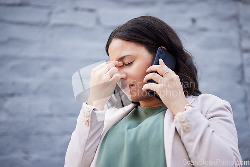 Image of Headache, phone call and business woman in city with bad news and stress from work. Burnout, urban and female professional frustrated from job fail with anxiety and mobile networking in conversation