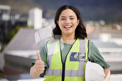 Image of Woman, engineering portrait and thumbs up for city development, construction goals and like, yes or support sign. Architecture person, worker or contractor with safety gear and ok or good job emoji