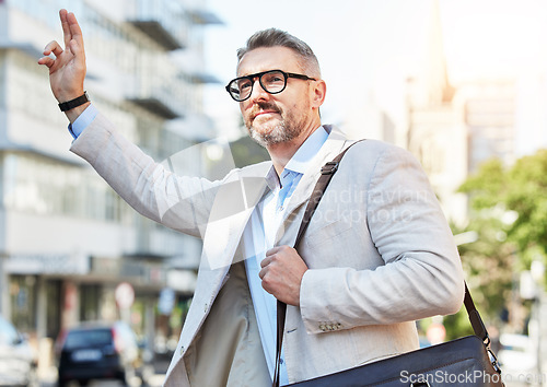 Image of Business, travel and man with hand for taxi, attention or hail in city on morning work commute. Bus, stop and guy manager with finger sign in a street for transportation, calling or waiting for cab