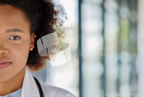 Image of Portrait, half face and a black woman or doctor at a hospital with mockup for advertising. Healthcare, medicine and a young African nurse or surgeon with space for marketing at a clinic with bokeh