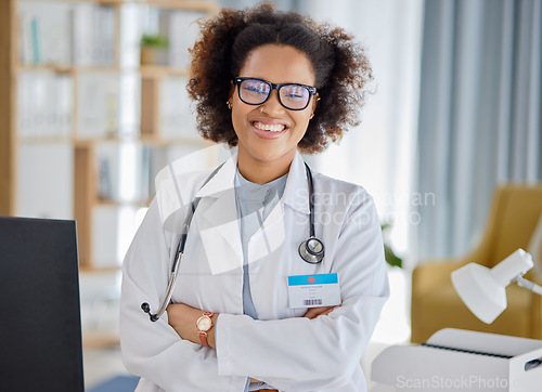 Image of Black woman, portrait and medical doctor with arms crossed for consultation, hospital support and help. Happy confident female therapist ready for professional healthcare, clinic consulting and trust