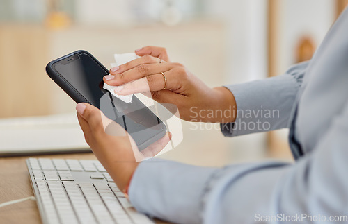 Image of Woman, hands and cleaning phone in office for mockup space of hygiene, health and virus safety. Closeup of worker wipe dirt on mobile screen with tissue for sanitation, disinfection and dust bacteria