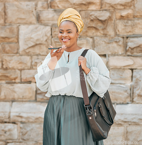 Image of Cellphone, voice recognition and black woman in the city walking in an urban street with a briefcase. Technology, memo and African female designer recording audio note or message on a phone in a town