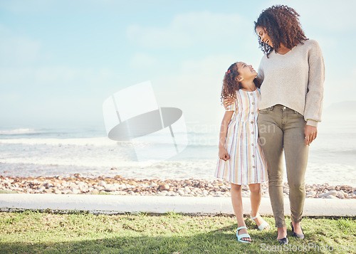 Image of Mockup, mother and child at the beach for vacation or holiday feeling happy, freedom and happiness together. Space, love and mom bonding with kid or girl as care, support and travel in summer