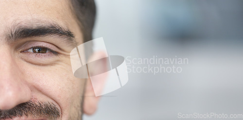 Image of Face, eyes and mockup with a man closeup for future vision or eyesight while looking happy or positive. Portrait, half and space with a young male person on a mock up banner for optometry or eye care