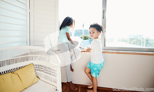 Image of Window, bedroom and portrait of children in home look outdoors for relaxing, playing and quality time. Family, siblings and young kids in apartment with scenic view for bonding, calm and childhood