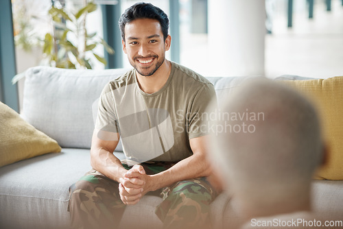 Image of Smile, soldier and man with psychologist for therapy, consultation and military communication. Happy, army veteran and counselling with therapist for mental health, help or support on sofa in office