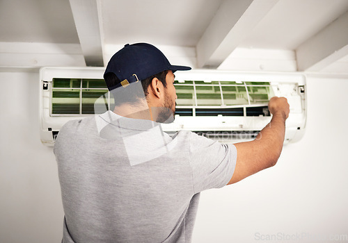 Image of Maintenance service, air conditioner technician and man, working on ventilation filter or ac repair. Contractor, handyman or electric aircon machine expert problem solving or cleaning dust with tools