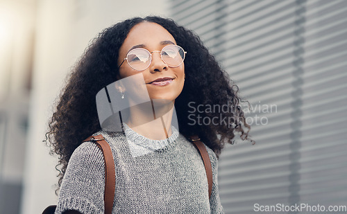 Image of Woman, portrait and city travel of student with glasses on a street with freedom. Urban, university holiday and happy face of young African person walking with backpack on adventure vacation outdoor