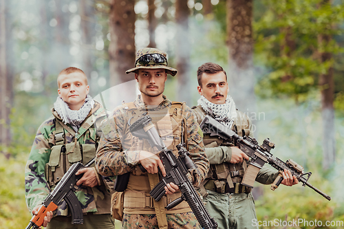 Image of Goup of soldiers in oposit sides celebrating peace after battle