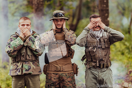 Image of Group of soldiers in oposit sides celebrating peace after battle by showing blind mute and deaf symbols