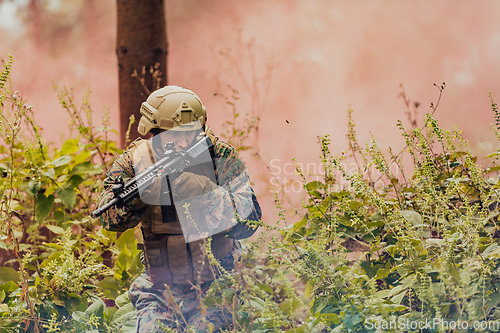 Image of Battle of the military in the war. Military troops in the smoke