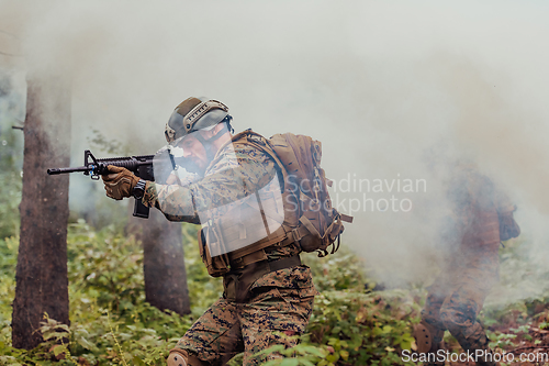 Image of Battle of the military in the war. Military troops in the smoke