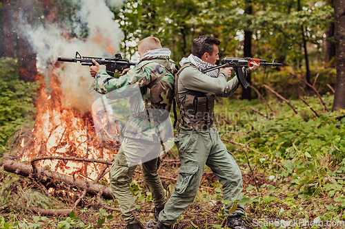 Image of Angry terrorist militant guerrilla soldier warrior in forest