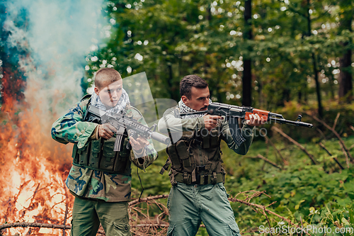 Image of Angry terrorist militant guerrilla soldier warrior in forest