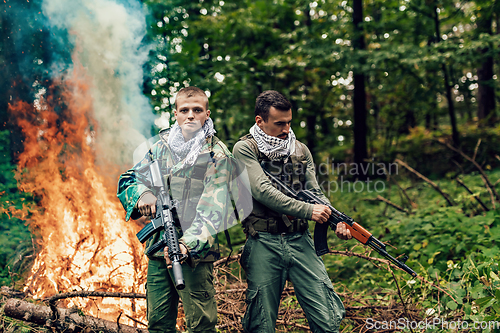 Image of Angry terrorist militant guerrilla soldier warrior in forest