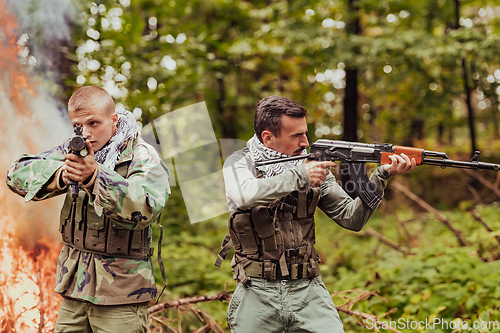 Image of Angry terrorist militant guerrilla soldier warrior in forest