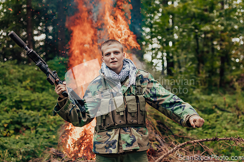 Image of Angry terrorist militant guerrilla soldier warrior in forest