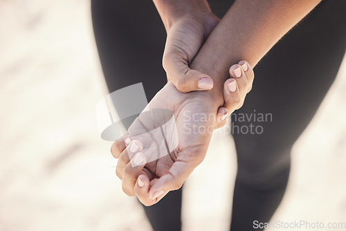 Image of Sports, closeup and woman with a wrist injury, accident or sprain muscle after a workout. Fitness, medical emergency and zoom of a female athlete with hand joint pain after a exercise or training.