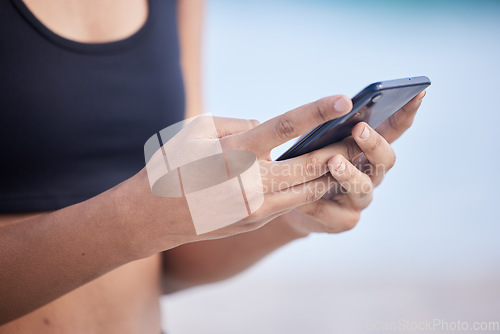 Image of Fitness woman, phone and hands typing for communication, social media or outdoor networking. Closeup of female person chatting or texting on mobile smartphone app for online browsing or research