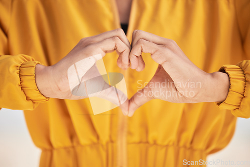 Image of Woman, heart hands and love for care, support or trust in healthcare, romance or gesture. Closeup of female person with emoji, symbol or icon for health, like or wellness in peace, sign or emoticon