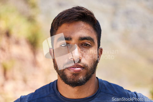 Image of Fitness, man or portrait of runner in training, workout or cardio exercise outdoors on road in summer. Relax, face or healthy Indian male athlete ready to start running with confidence in nature