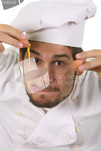 Image of funny chef cracking an egg