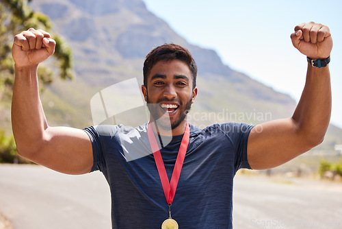 Image of Fitness, winner and portrait of man with medal on mountain for exercise, training and running race. Sports, success and face of excited male runner cheer for competition, challenge and cross country