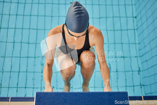 Image of Swimming pool, sports and woman for back stroke for exercise, training and workout for competition in gym. Fitness, water sport and female swimmer on start block for race, challenge and performance