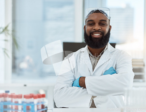 Image of Medical science, portrait and a man in a laboratory for research, study and career pride. Happy black male person or scientist with arms crossed for innovation, biotechnology and future development