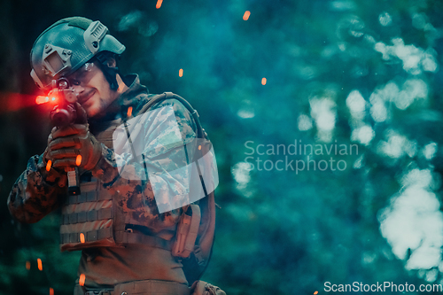 Image of A soldier fights in a warforest area surrounded by fire