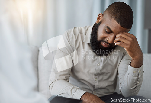 Image of Sad black man, therapist and counselling for psychology, mental health crisis and therapy for stress. Confused patient consulting psychologist for frustrated problem, anxiety and crying in depression