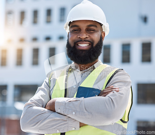 Image of Construction, portrait or man with arms crossed in city for building project, site maintenance or civil engineering. Architecture, happy African professional contractor for urban property development