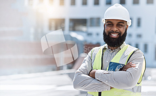 Image of Man, engineering portrait and arms crossed at city construction site, solar panels and rooftop design technician. Happy face of african person, architecture, worker or contractor in outdoor mockup
