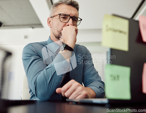 Image of Stress, insurance and finance with a business man in an office, at his desk while problem solving for bankruptcy. Thinking, accounting or audit with a male employee worried while working on a laptop