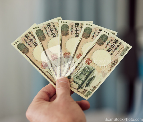 Image of Yen, money fan and hands with cash for banking, trading paper bills and economy of financial freedom. Closeup of rich investor, profit and income of japanese payment, savings and budget of accounting