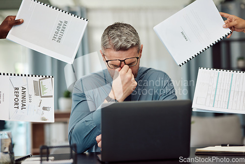Image of Business man, stress and overwhelmed with headache, documents and staff hands in busy office. CEO, manager or tired boss with laptop, paperwork and burnout with employee group at marketing agency