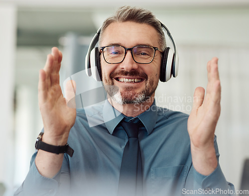 Image of Portrait, business and man applause on video call, smile and headphones at home. Happy face, clapping and webinar of mature manager with glasses in virtual meeting, online celebration or remote work