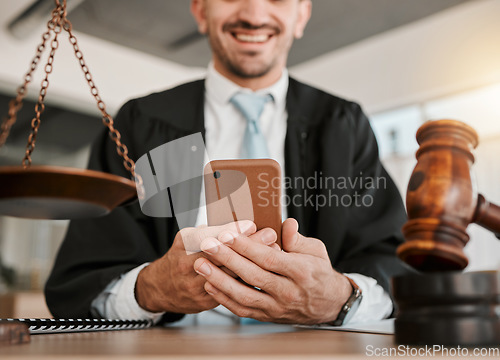 Image of Judge hands, phone and happy man reading attorney communication, networking or contact legal consultant. Lawyer, cellphone and male advocate smile for government justice, contract or policy update