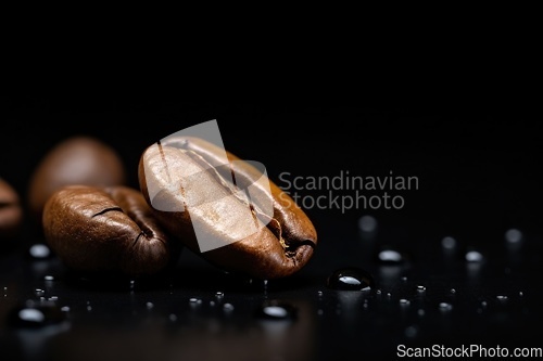 Image of Coffee beans heap on black