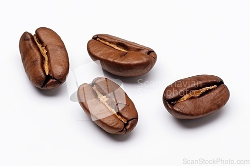 Image of Coffee beans heap on white