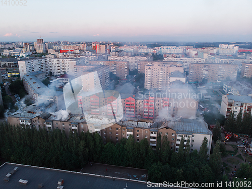 Image of Aerial shots of house burning