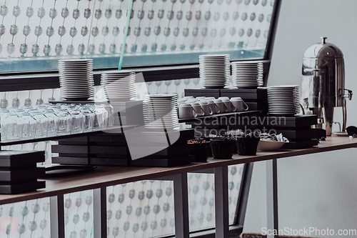 Image of A table in a modern hotel with dishes ready to serve guests