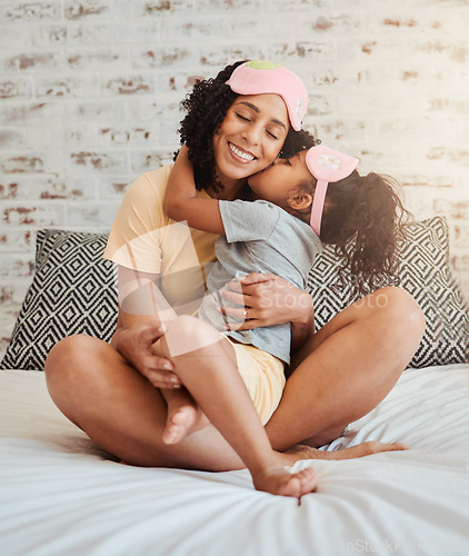 Image of Love, hug and mother with child on bed for bonding, quality time and affection in morning. Family home, happiness and mom embrace daughter after sleeping, dreaming and relax in bedroom together