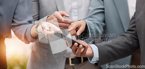 Image of Business people, phone and hands pointing outdoor to social media and networking app. Group, technology and employee mobile blog with online communication and digital check on company website