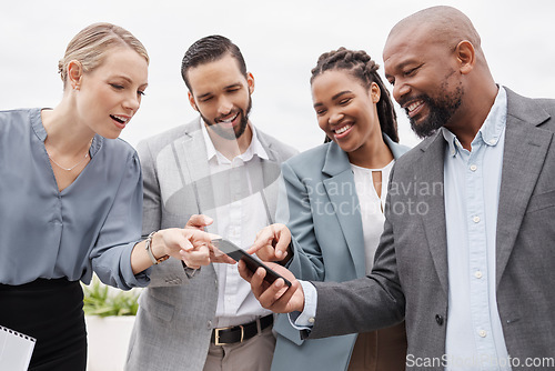 Image of Business people, phone text and pointing outdoor to social media and networking app. Happy group, technology and employee mobile blog with online communication and digital check on company website