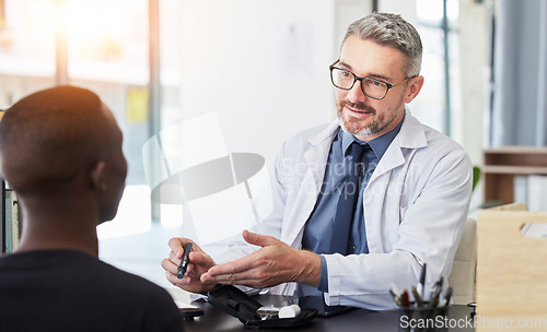 Image of Consulting, doctor and diabetes with man and patient in hospital for advice, glucose exam and blood test. Healthcare, medicine and feedback with people in clinic for discussion, results and wellness