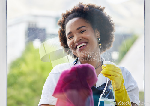 Image of Black woman, cleaning spray and bottle on windows with cloth for hygiene of bacteria, dust and germs. Happy cleaner, housekeeping and chemical liquid for dirt, glass surface and hospitality services